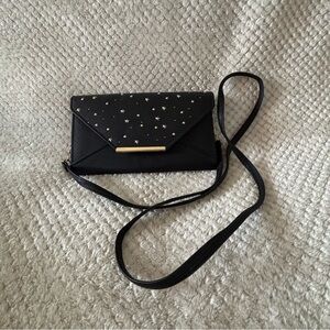 Elegant Black Clutch with Gold Accents